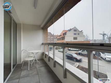 4 pokoje z loggią i halą w centrum miasta