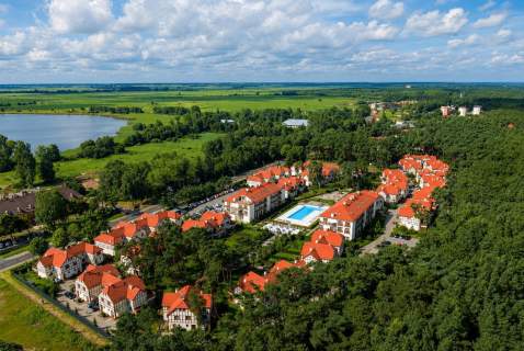Dom sąsiadujący z plażą na osiedlu rezydencyjnym