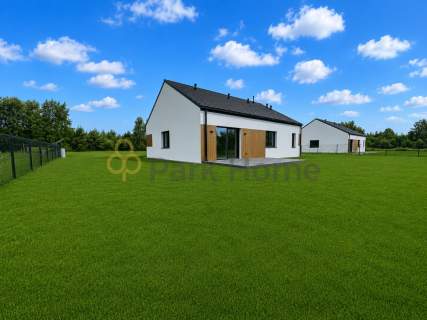 Nowoczesny dom parterowy z garażem Gronów 115,