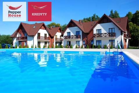 Dwupoziomowy apartament nad morzem z basenem