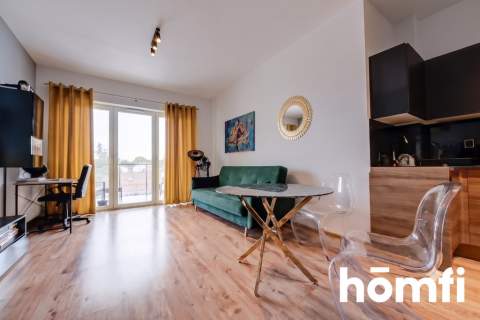 PRZESTRONNA KAWALERKA W APARTAMENTOWCU