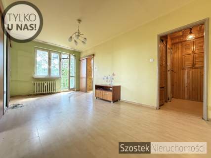 M. w ładnym bloku na pełnym zieleni Rakowie