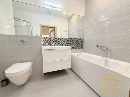 Apartament z prywatnym ogrodem w Browarze Lubicz