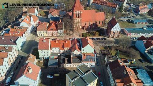 Mieszkanie plus działki w Pasłęku