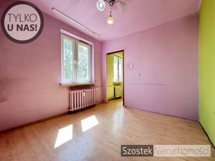 M. w ładnym bloku na pełnym zieleni Rakowie