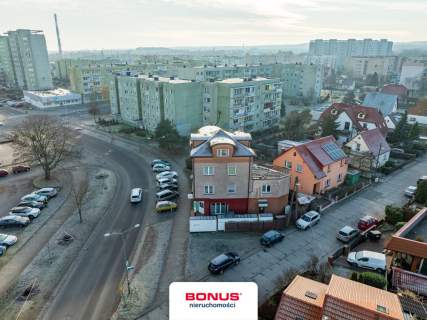 Budynek mieszkalno-usługowy 5 mieszkań 2 lokale