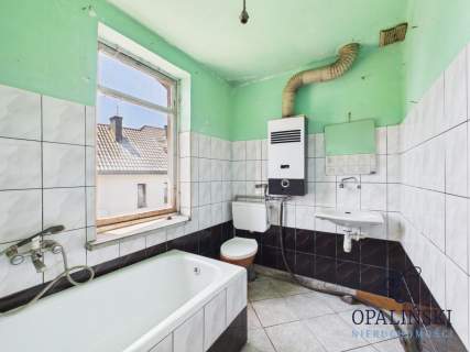 Dom z ogrodem i garażem w świetnej lokalizacji