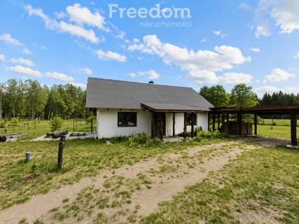 Dom z dużą działką w urokliwym otoczeniu lasu