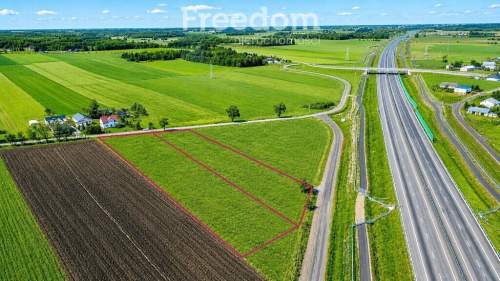 Działki Sitnik media w drodze blisko E30 i A2