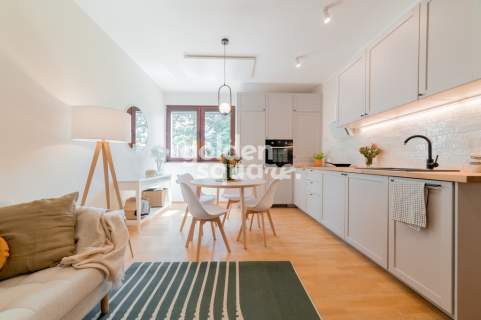 Designerski Apartament z Garażem w Pięknej Okolicy
