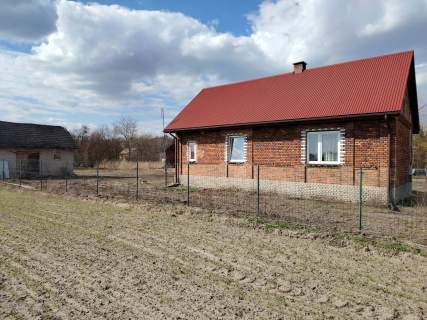 Sprzedam dom na działce o powierzchni 16ar tel .