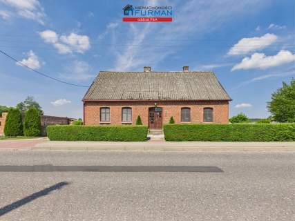 Urokliwy dom z cegły obok jeziora Stryjewo