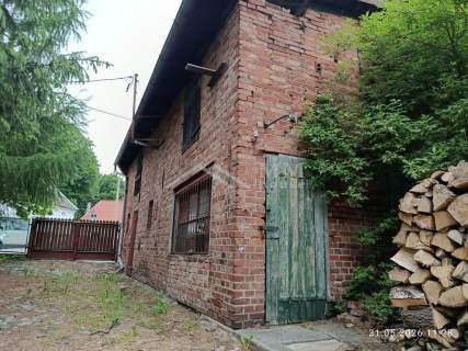 Frombork działka z budynkiem dospodarczym.