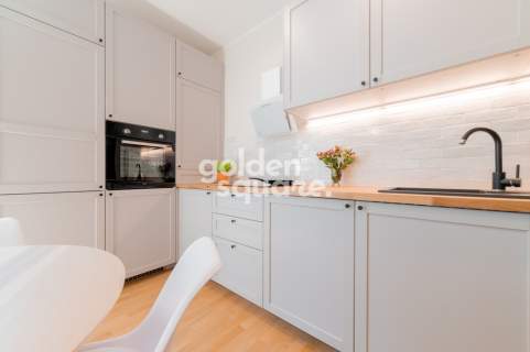 Designerski Apartament z Garażem w Pięknej Okolicy