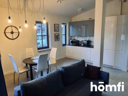Nowoczesny apartament z klimatyzacją, balkonem i