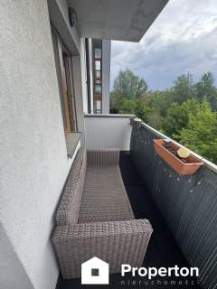 Kawalerka z balkonem Marki