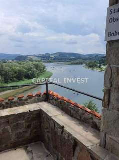 Działka w górach nad jeziorem i rzeką.