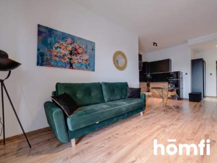 PRZESTRONNA KAWALERKA W APARTAMENTOWCU