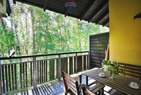 Apartament wakacyjny w sercu sosnowego lasu