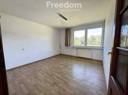 Dwupoziomowe mieszkanie z garażem i ogrodem