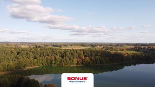 Działka z projektem domu i udziałem w plaży.