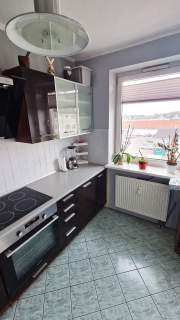Kawalerka z osobną kuchnią, garderobą i balkonem