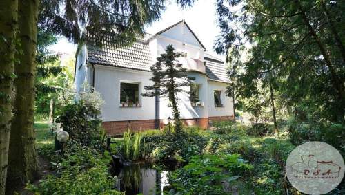 Dom z duszą na leśnej skarpie Puszczykowo Górne