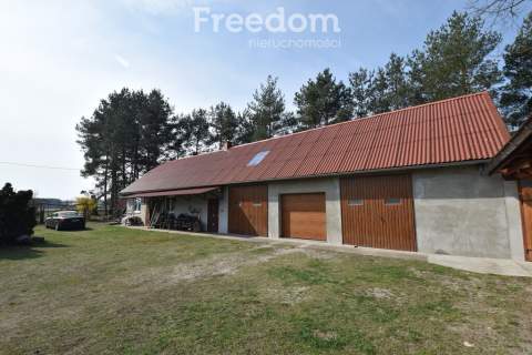 Działka 53 980 m2, 2 domy b.gospodarczy,staw, las