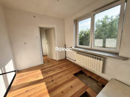 Dom z dwoma mieszkaniami. Duża działka 0,25 ha