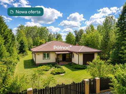 Dom z 35-arową działką i 3 garażami
