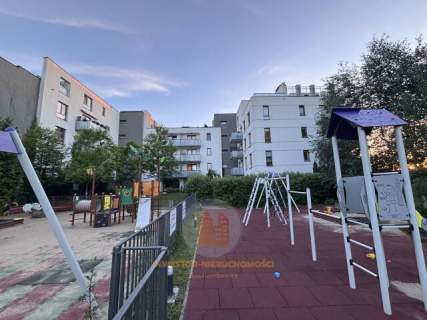 Apartament 2-pokoje z ogródkiem, komórką i garażem