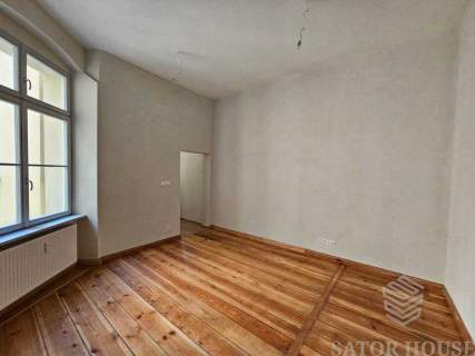 Apartament w odrestaurowanej kamienicy obok Rynku