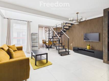 Dwupoziomowy apartament z antresolą 69.6 m2