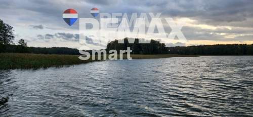 Działka budowlana z linią brzegową, Skolity