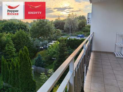 2 pokoje z miejscem postojowym i balkonem