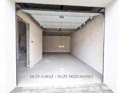 Segment narożny z ogrodem i garażem Ochojno