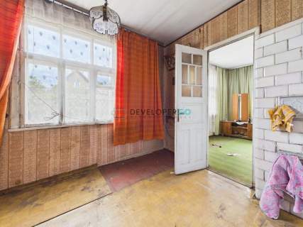 Drewniany dom do remontu, działka 951 m2