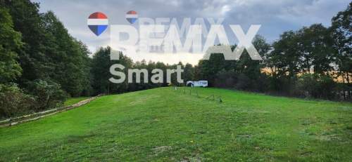 Działka budowlana z linią brzegową, Skolity