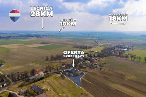 Dom z dużą działką i budynkami gospodarczymi