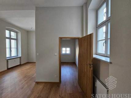 Apartament w odrestaurowanej kamienicy obok Rynku