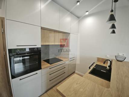 Rewal-elegancki apartament miejsce parkingowe.