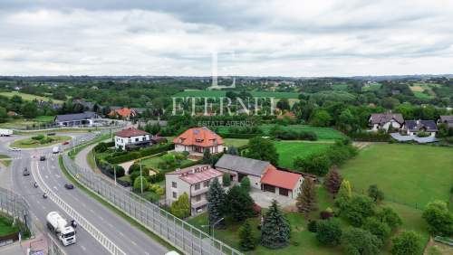 Działka mieszkaniowo-usługowa 16 arów przy DK94