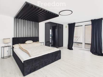 Dwupoziomowy apartament z antresolą 69.6 m2