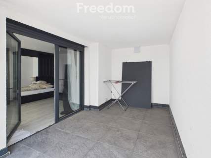 Dwupoziomowy apartament z antresolą 69.6 m2