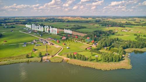 Działka budowlana z domkiem i widokiem na Jezioro