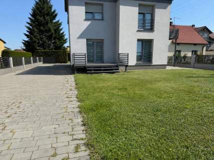 Połowa domu z ogrodem w Jejkowicach