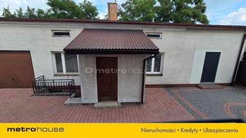 Dom z dodatkowym budynkiem mieszkalnym Widok