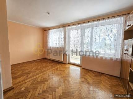 2 pokoje - na parterze, piwnica , garaż i ogródek