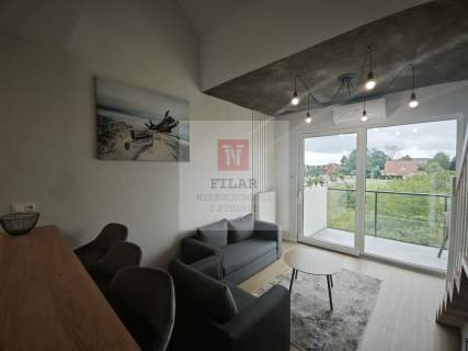 Rewal-elegancki apartament miejsce parkingowe.