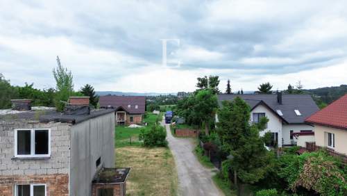 Działka mieszkaniowo-usługowa 16 arów przy DK94